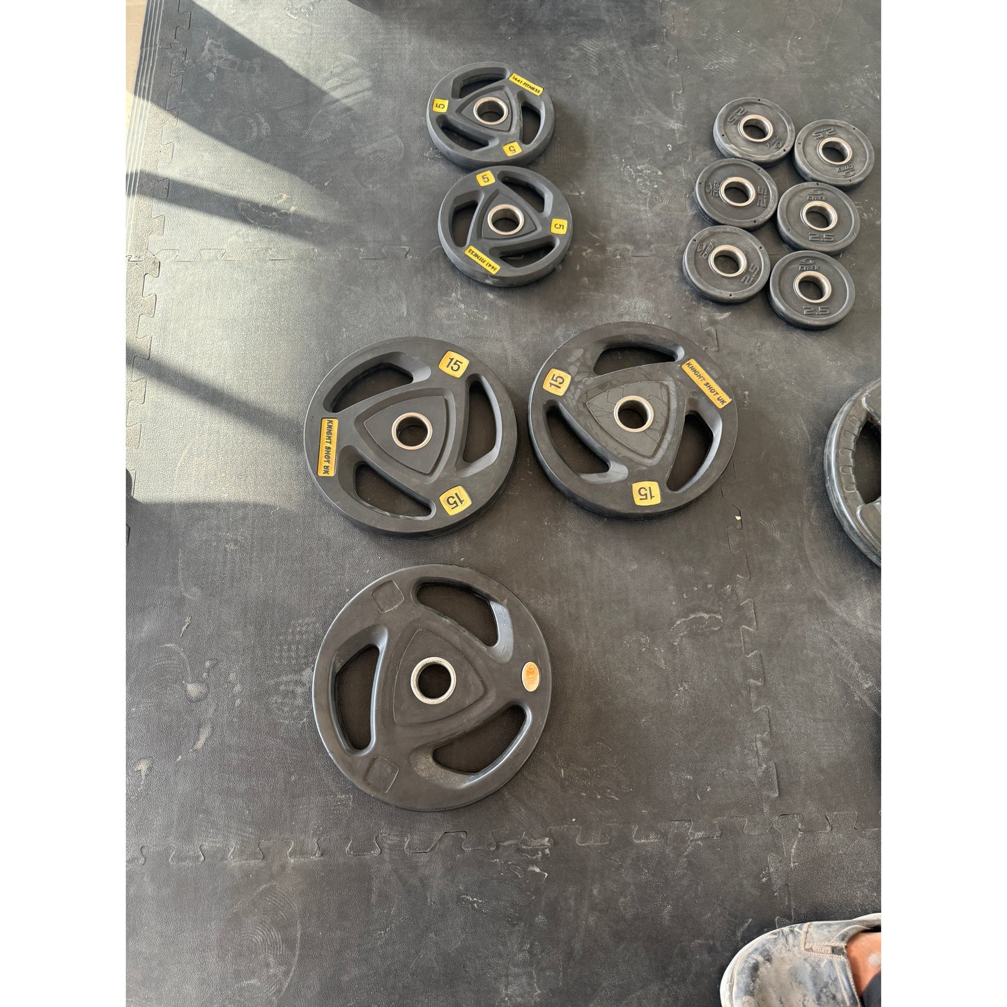 250 KG Olympic Weight Plate Set + Hammer Strength Plate Tree